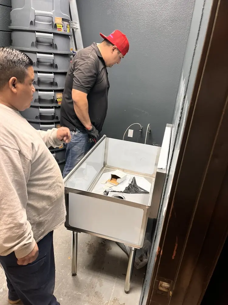 Commercial plumbing and sink installation in Visalia